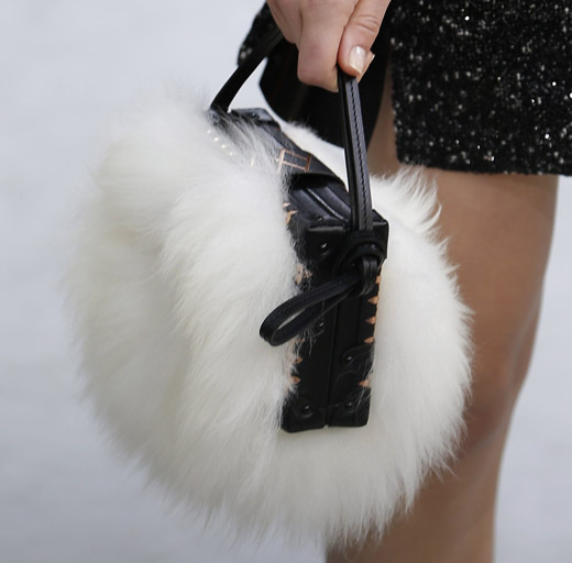 Fur, animal prints and box-like handbags by Louis Vuitton for Fall-Winter 2015/2016