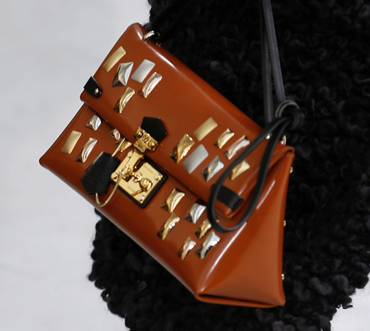 Fur, animal prints and box-like handbags by Louis Vuitton for Fall-Winter 2015/2016