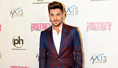 Fashion icon Adam Lambert dressed in suits