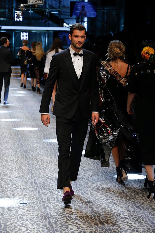 Tennis player Grigor Dimitrov on the catwalk during Dolce and Gabbana fashion show