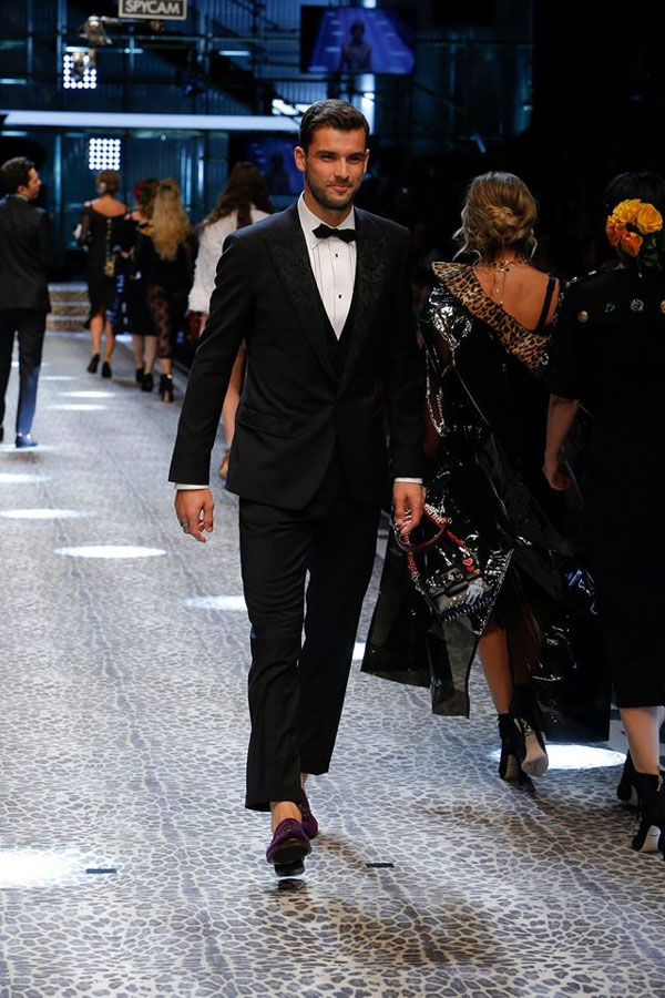 Grigor Dimitrov on the catwalk during Dolce and Gabbana fashion show