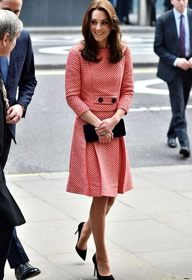 Kate Middleton in a 60s inspired skirt suit by Bulgarian designer Petar Petrov