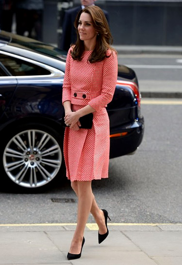 Kate Middleton in a 60s inspired skirt suit by Bulgarian designer Petar Petrov