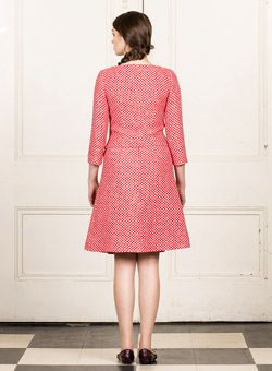 Kate Middleton in a 60s inspired skirt suit by Bulgarian designer Petar Petrov