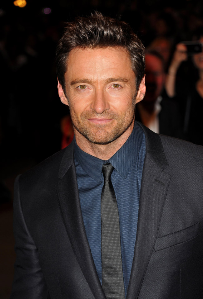 HUGH JACKMAN was as dashing as ever in a navy blue Louis Vuitton