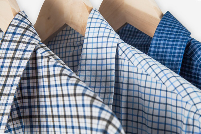 A high performance, machine washable, dress shirt that never wrinkles