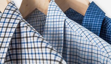 A high performance, machine washable, dress shirt that never wrinkles