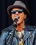 Bruno Mars' Fashion Style: A Blend of Retro and Modern Flair