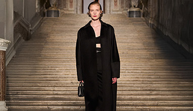 Beyond the season: the black wool coat as a lasting statement