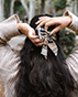 Holiday Party Hair Accessories: Bows, Velvet and Claw Clips to Wear This Season