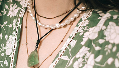 How Layering Jewelry Can Elevate Any Outfit